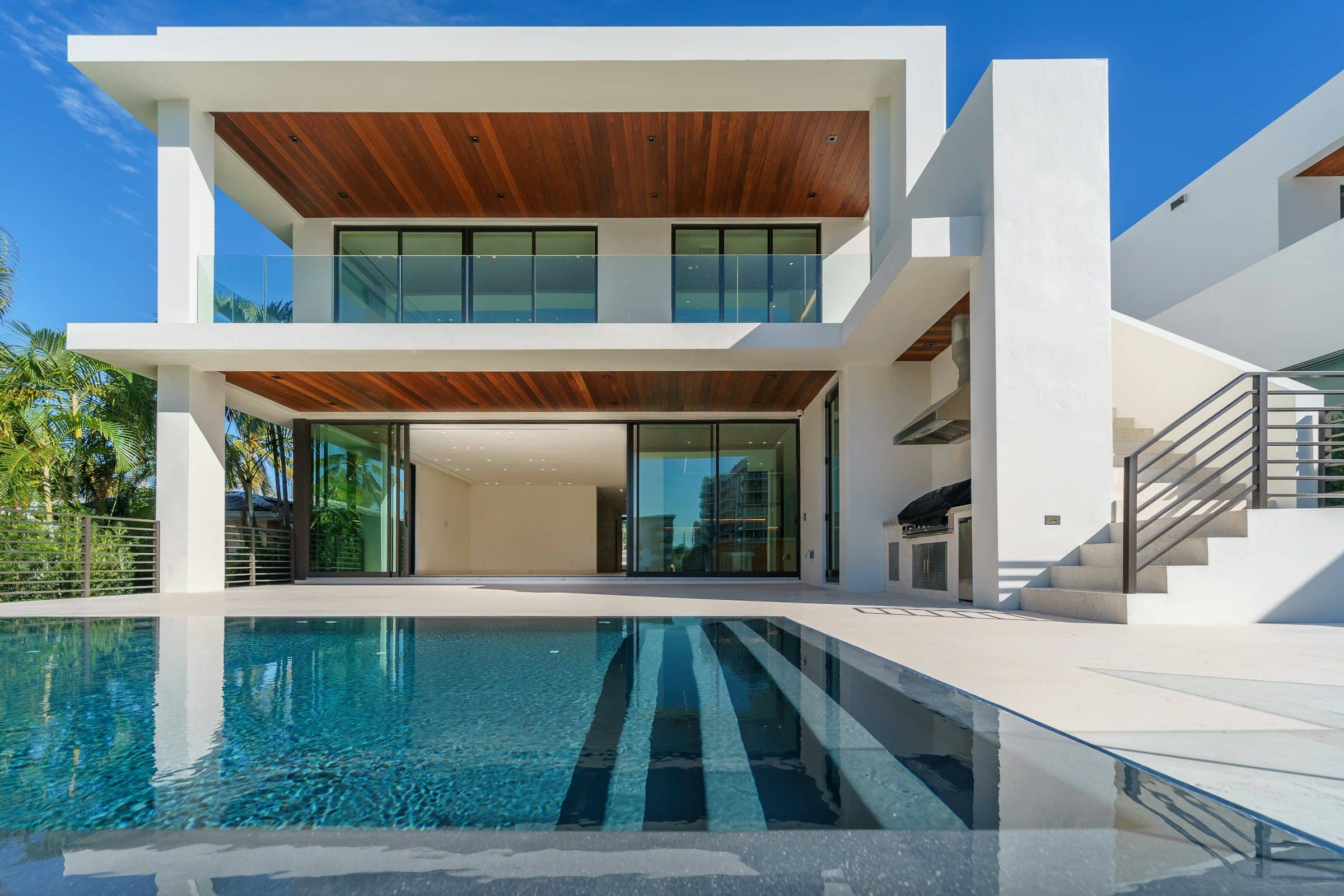 Modern villa with reflecting pool operated as a vacation rental